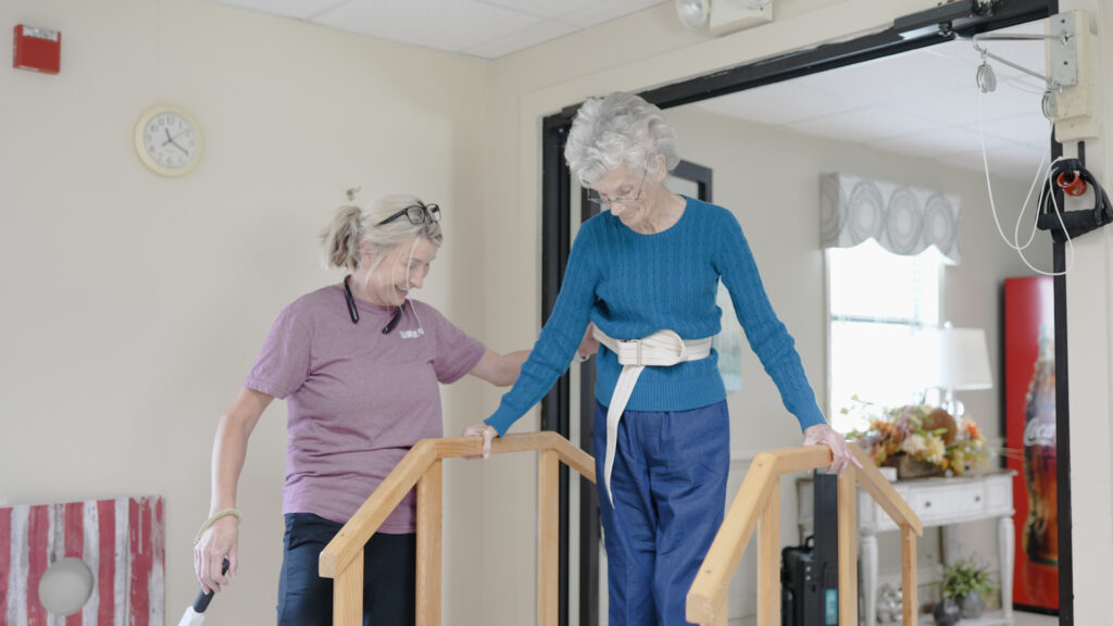 A woman in therapy, participating in the short term rehab provided by beebe retirement